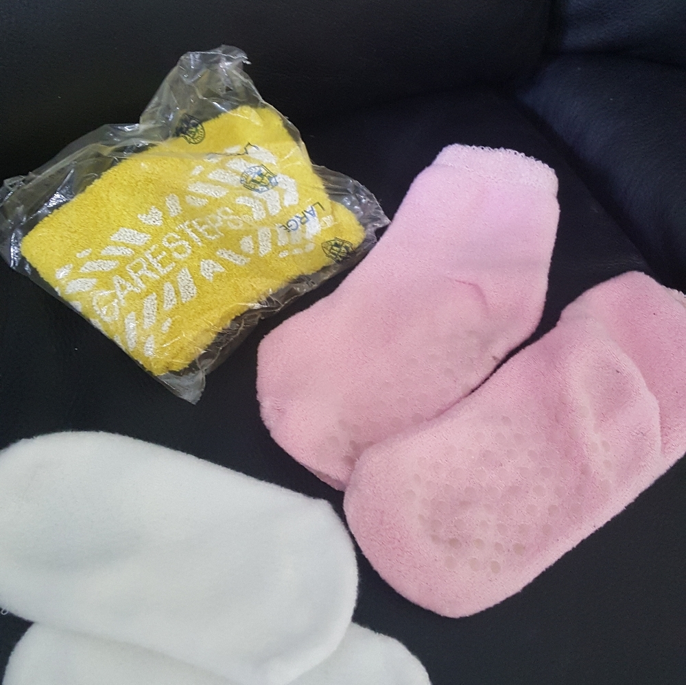 $5 or fwp. Slip resistant socks/booties. 3 pr lot